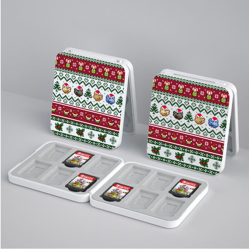 The Stardew Christmas Game Card Box for Nintendo Switch by petimint features two festive cases with holiday-themed designs. These cases showcase rows of pixel art chicks and other decorations in red, green, and white. Perfect for any gamer, each case holds four game cards, with two cards displayed next to the cases.