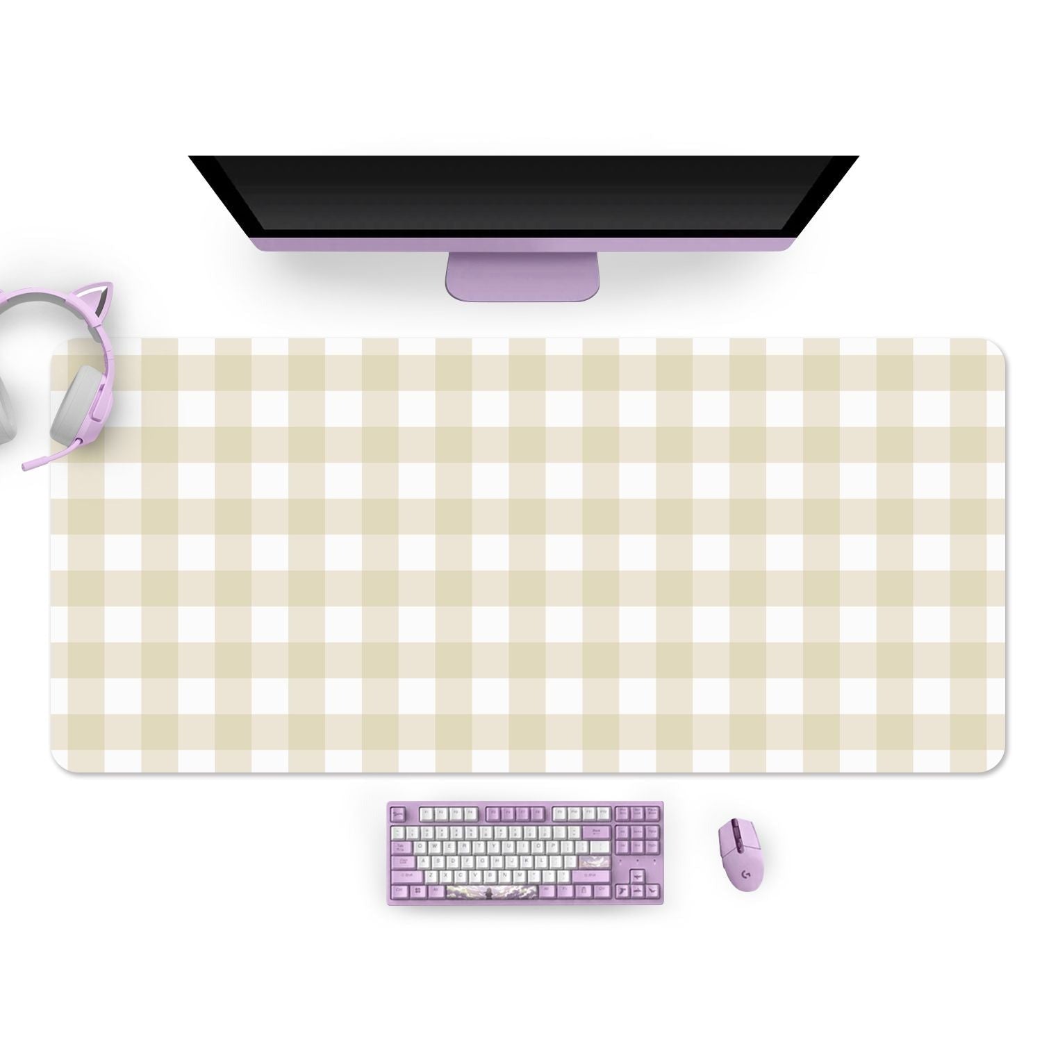 A cozy gamer workspace setup featuring the Picnic Mouse Pads PC Gaming Accessories by petimint in beige and white checkered design. On the desk mat, there is a slim monitor, a lavender mouse and keyboard, and lavender cat-ear headphones resting on the left side. A Nintendo Switch adds to the charming gamer vibe of the space.