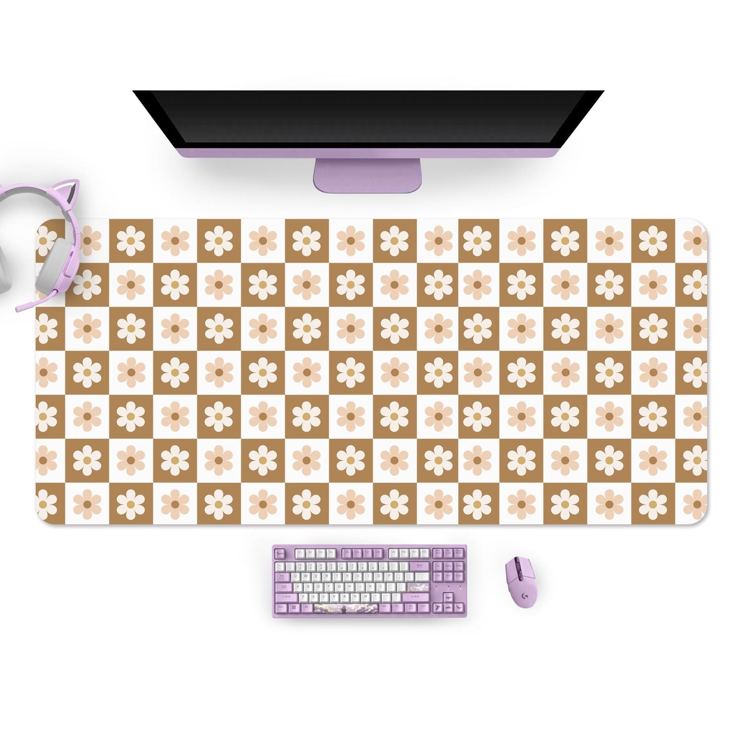 A computer setup with a widescreen monitor, purple cat ear headphones, a purple mechanical keyboard, and a purple mouse on the petimint Cozy Checkered Flowers Mouse Pad with brown and beige squares, each adorned with cute cartoon patterns of white daisy flowers in the center.