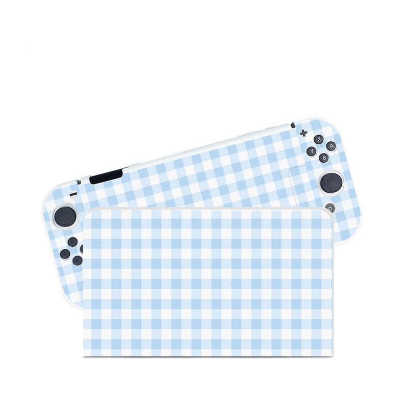 The Picnic Case for Nintendo Switch by petimint features a light blue and white checkered design on both the screen cover and the controllers, reminiscent of stylish apparel. The buttons and joystick are visible on the controllers, which flank both sides of the device, making it perfect for any Nintendo Switch enthusiast.