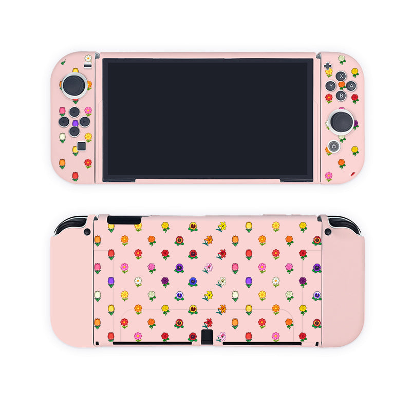 A cozy gamer's dream, the Flower Crossing Case for Nintendo Switch by petimint features a pink casing adorned with small, colorful flower illustrations. The charming floral patterns grace both the controller and the back of the console. Buttons and joysticks are neatly visible through the case, making it perfect for your next Nintendo Switch session!