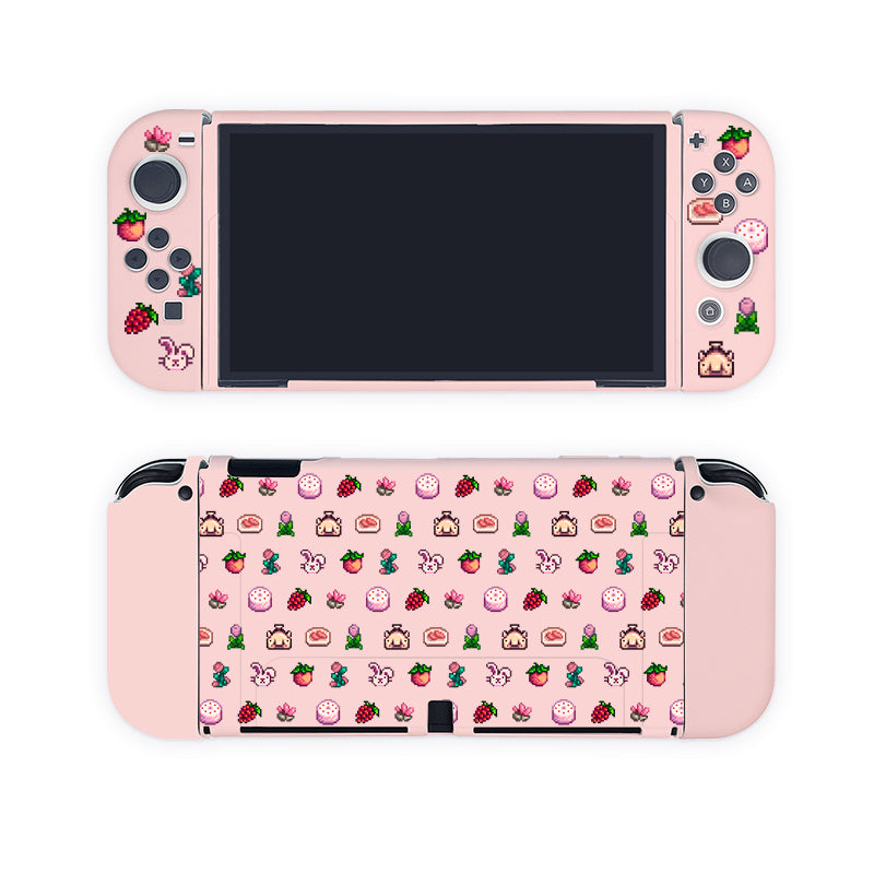 A Pink Stardew Items Case for Nintendo Switch by petimint, decorated with charming strawberry-themed stickers. The front showcases strawberries, flowers, and other small icons around the screen and buttons. The back features a repetitive pattern of strawberries, flowers, bunnies, and cake slices—perfect for any gamer with a sweet tooth.