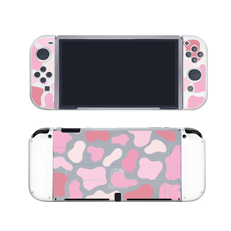 Introducing the Strawberry Cow Case for Nintendo Switch by petimint: a handheld gaming console adorned with a stylish pink and white camouflage design on both sides. It features a black screen, complemented by an assortment of buttons and joysticks. The entire setup is enclosed in a soft TPU Switch grip case to enhance comfort during gameplay.