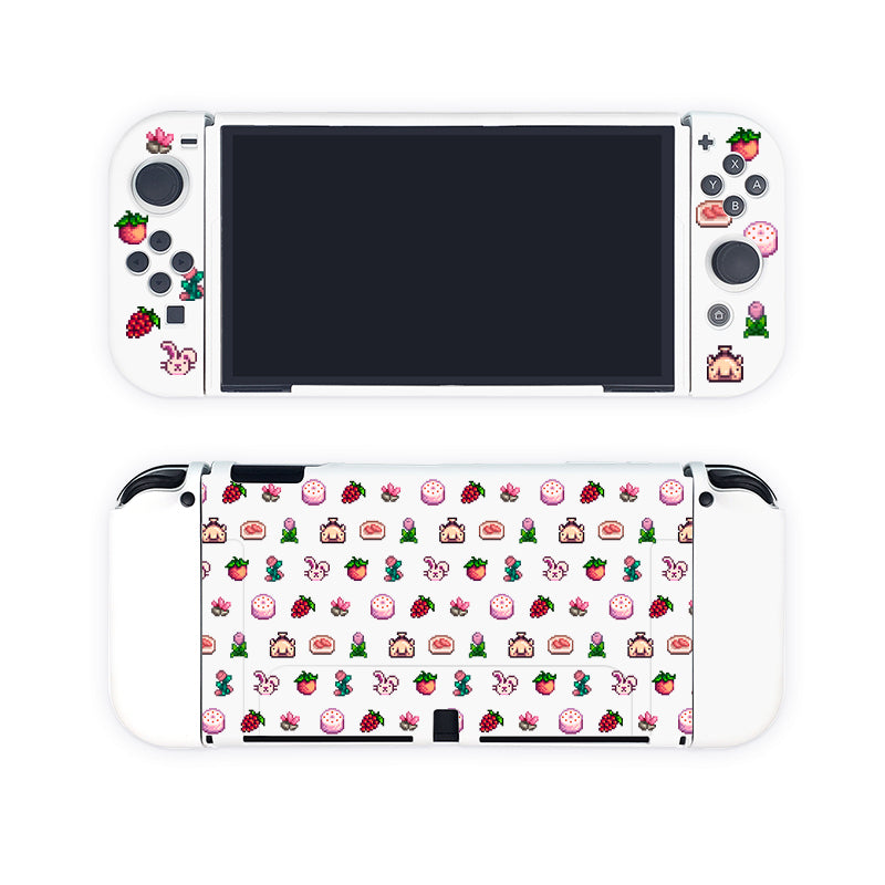 Introducing the Pink Stardew Items Case for Nintendo Switch by petimint, a handheld gaming console accessory designed for the cozygamer. It features white controllers adorned with cute and colorful stickers, including strawberries, bunnies, cherries, flowers, and cakes in a delightful repeating pattern. The centrally positioned screen is beautifully encircled by these charmingly decorated controllers.