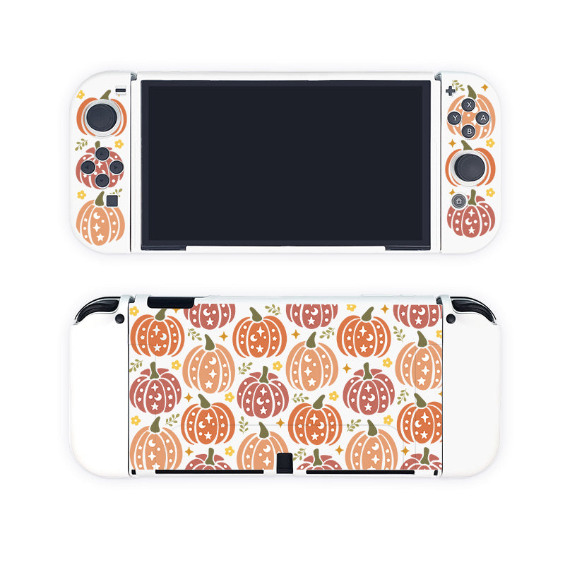 Introducing the Pumpkins Case for Nintendo Switch by petimint: a gaming console case with a white body and a charming pumpkin-themed design. The front showcases the screen surrounded by strategically placed buttons and joysticks, while the back is adorned with an array of orange-patterned pumpkins—perfect for any cozy gamer or Nintendo Switch enthusiast.