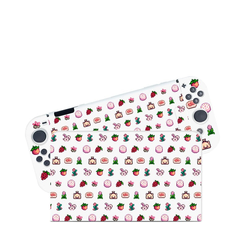 Introducing the Pink Stardew Items Case for Nintendo Switch by petimint, a white handheld gaming console case adorned with a charming pattern of strawberries, flowers, teacups, and pink bunnies. This whimsical design decorates both the back of the case and its detachable controllers, making it an essential accessory for any gamer. Perfect for those looking to add a touch of whimsy to their Nintendo Switch experience.