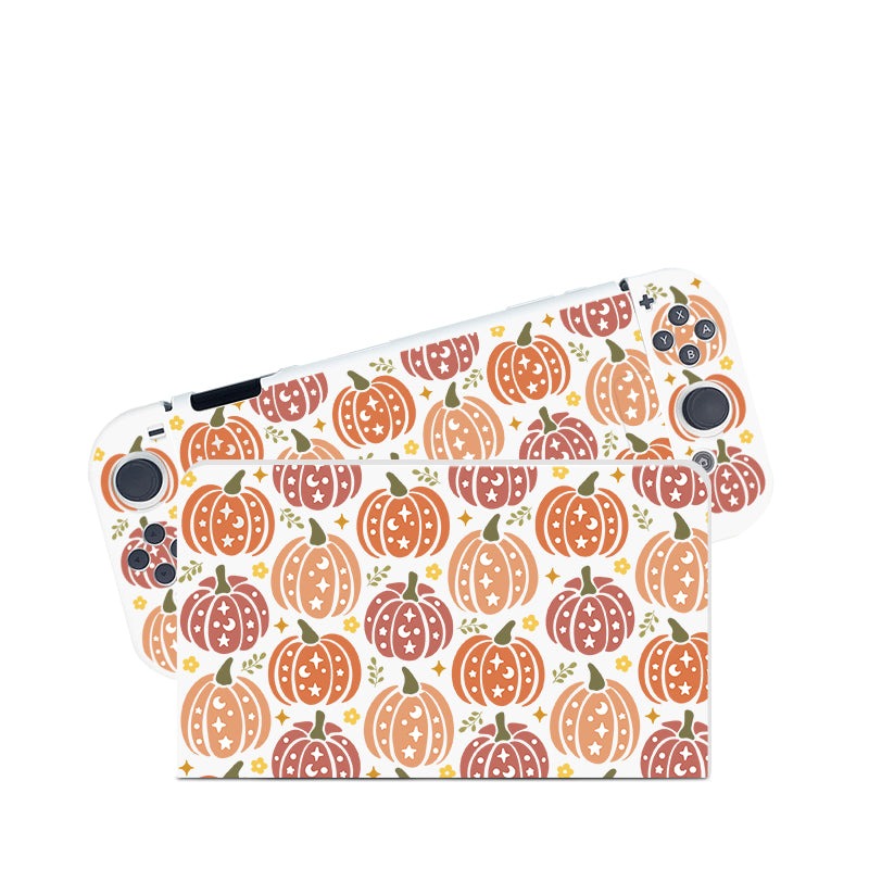 Introducing the Pumpkins Case for Nintendo Switch by petimint: a stylish, handheld gaming console case adorned with a festive patterned skin showcasing various orange and beige pumpkins alongside whimsical leaves and stars. Ideal for any cozygamer, this case perfectly displays its eye-catching design on both the front and back when viewed from an angle.