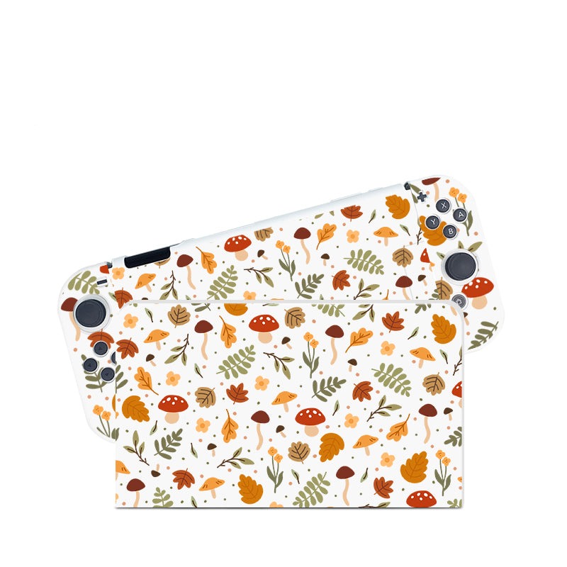 Introducing the Cozy Autumn Case for Nintendo Switch by petimint: a handheld gaming console accessory adorned with a whimsical autumn-themed design. The pattern features various elements such as mushrooms, leaves, acorns, and other fall foliage in shades of orange, brown, and green on a white background. This switch grip case offers both style and functionality for avid gamers.