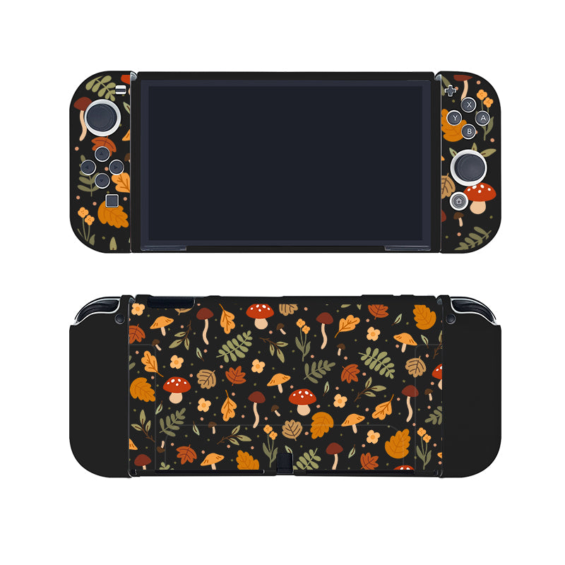 The Cozy Autumn Case for Nintendo Switch by petimint is a handheld gaming console cover in black, with a decorative dockable case that features various autumn-themed illustrations, including mushrooms, leaves, and acorns in warm shades of orange, red, and brown. This cover surrounds the screen and controls, adding a festive, earthy touch.