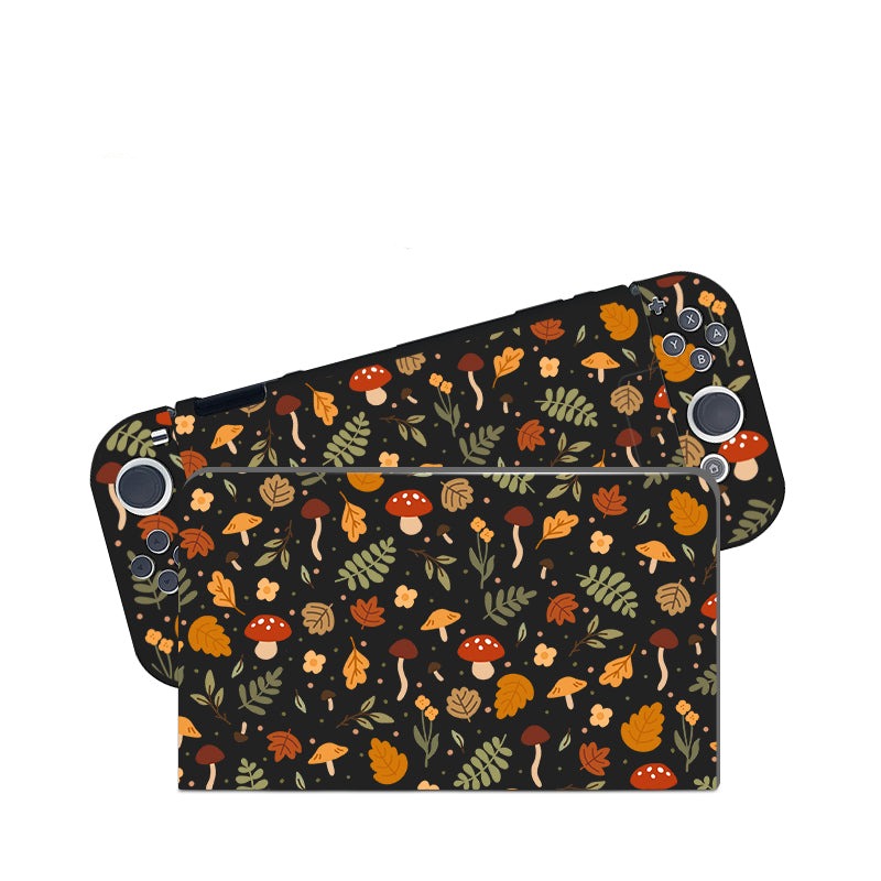 The Cozy Autumn Case for Nintendo Switch by petimint, along with its Dockable Case and switch grip case, is adorned with a whimsical autumn-themed pattern featuring various mushrooms, leaves, and small plants in orange, brown, yellow, and green hues on a black background.