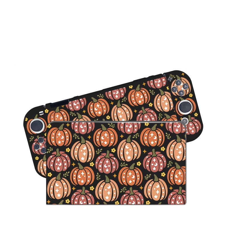Introducing the Pumpkins Case for Nintendo Switch by petimint, a handheld gaming console case with a vibrant pumpkin-themed design perfect for the cozy gamer. The control buttons and joysticks are visible, while the entire surface is adorned with an autumn pattern featuring orange, pink, and brown pumpkins along with stars and flowers.