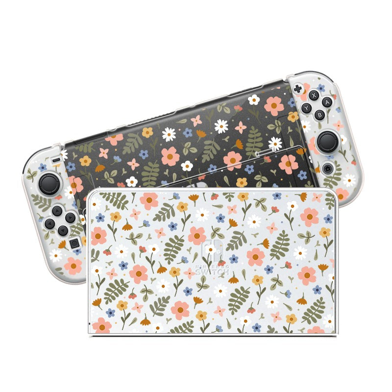 The Spring Case for Nintendo Switch by petimint includes a handheld gaming console and its docking station, both adorned with a floral pattern. The console's main body features a dark background with various colorful flowers, perfect for any gamer, while the docking station has a light background with a similar floral design.