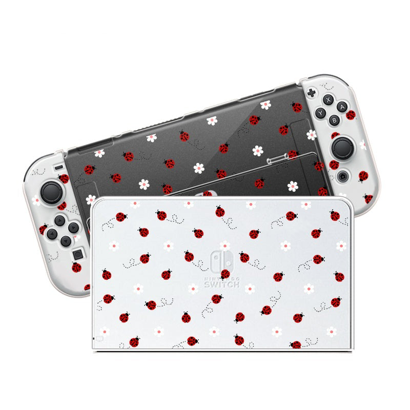 A cozygamer’s dream: A petimint Nintendo Switch console featuring the Little Ladybug Case with attached Joy-Cons. The console cover is white, while the Joy-Cons are adorned with a charming ladybug pattern on a dark background, making your gaming experience as delightful as it is stylish.