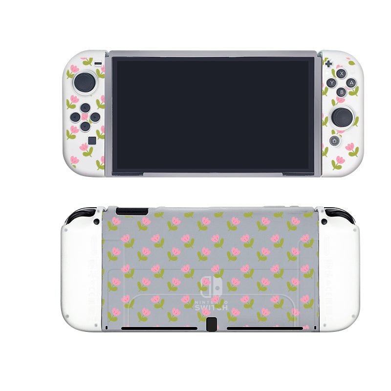 The Pink Tulips Case for Nintendo Switch by petimint is adorned with a charming floral pattern of small pink tulips and green leaves on a soft gray background. Perfect for the cozygamer, this elegant design graces both the front and back of your console, adding a touch of sophistication to your gaming setup.