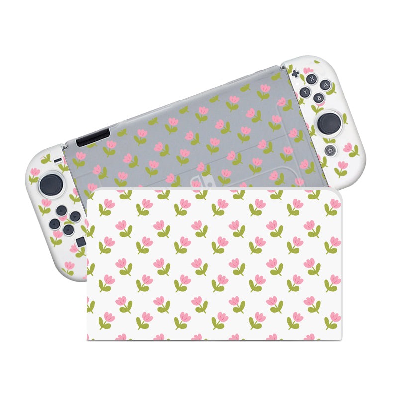 Introducing the Pink Tulips Case for Nintendo Switch by petimint: a delightful gaming console and controller accessory featuring a matching floral design on a pristine white background. The elegant pattern consists of small pink tulips with subtle green leaves, making it perfect for the cozygamer. This case covers the entire surface, allowing buttons and joysticks to remain perfectly visible while enhancing your device's aesthetic.