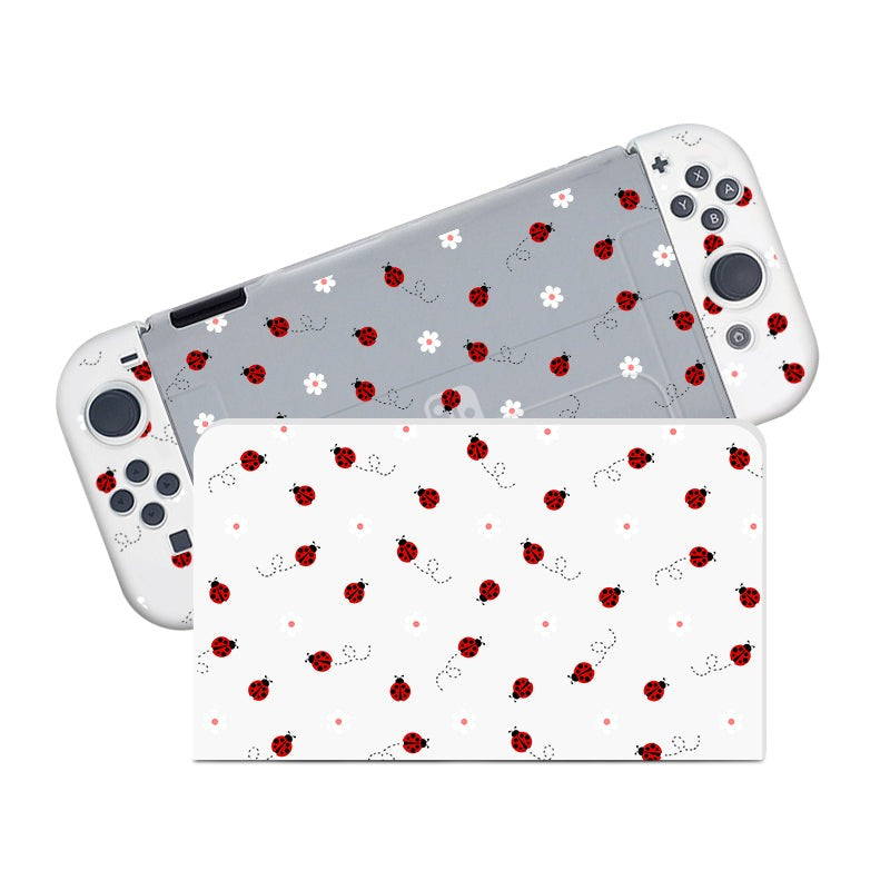 The Little Ladybug Case for Nintendo Switch by petimint features a delightful white and gray color scheme adorned with a whimsical ladybug and flower pattern. Red ladybugs and white flowers are evenly distributed across the detachable controllers and console surface, creating a playful and charming design perfect for any gamer.