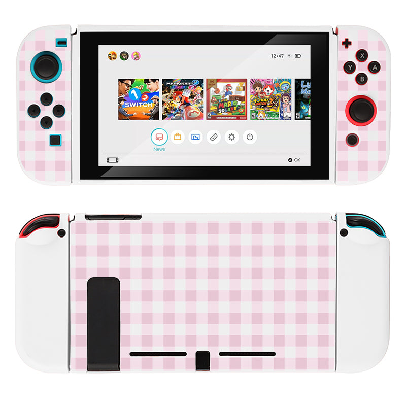 Experience the charm of the petimint Picnic Case for Nintendo Switch, featuring a custom pink and white checkered design on the back and matching Joy-Con controllers – the perfect choice for any cozygamer. The screen displays a variety of game icons, including "Mario Kart 8," "Animal Crossing," and more. The left Joy-Con boasts blue buttons, while the right Joy-Con features red buttons.