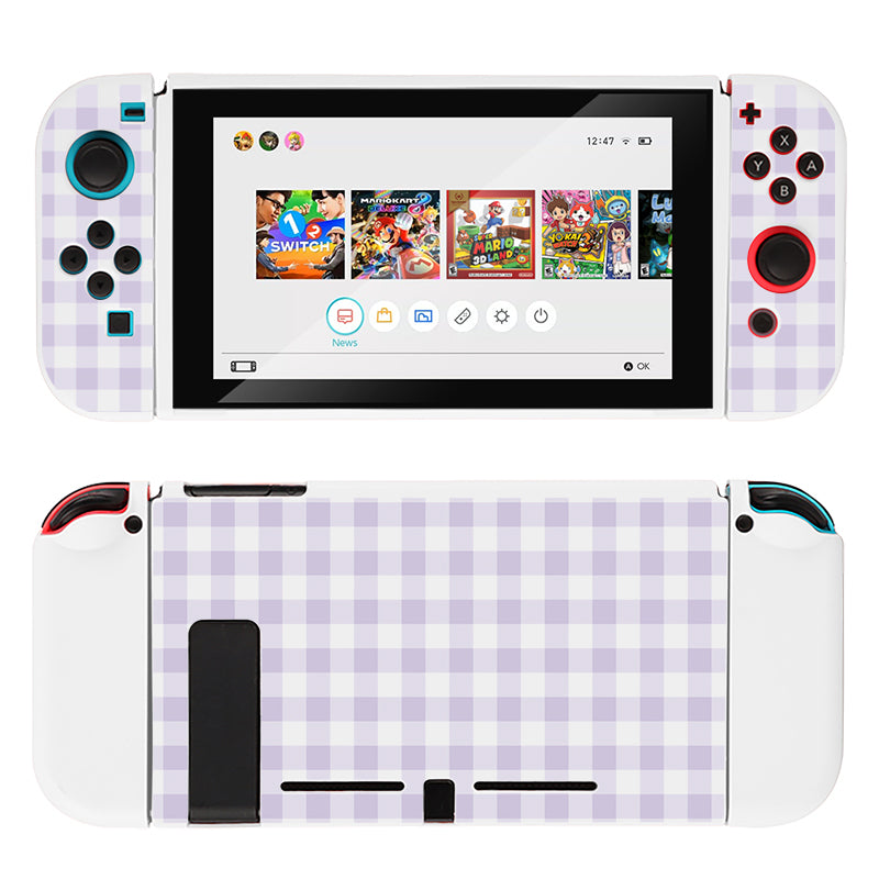 A Picnic Case for Nintendo Switch from petimint, featuring a white and light purple checkered pattern on the back, reveals a game selection menu on its front screen. The console has blue and red buttons on the left and right controllers respectively, encased in soft TPU material for added grip.