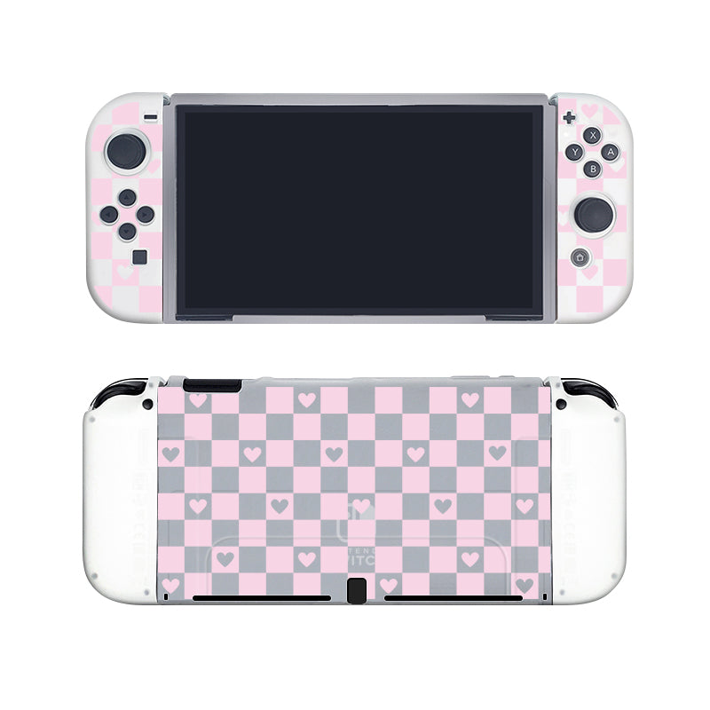 Introducing the Checkered Love Case for Nintendo Switch by petimint. This semi-clear protective case features a charming white base color with a pink and white checkerboard pattern. The front side accommodates all the buttons and screen, while the back is adorned with the whimsical checkerboard design, complete with small pink hearts. It's an ideal accessory for any cozygamer who adores cute aesthetics.