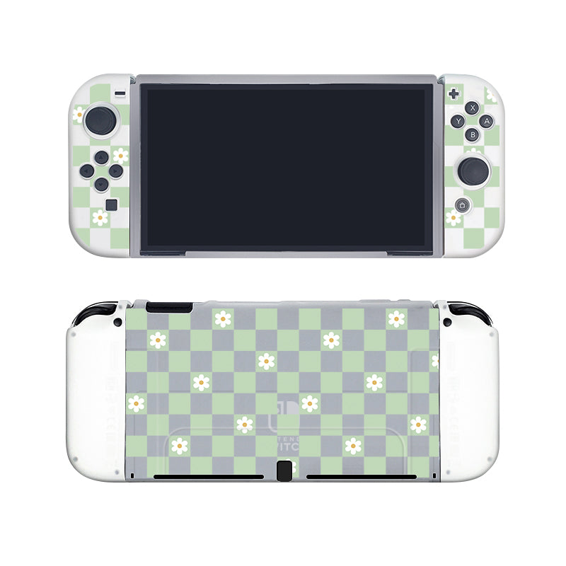 The Checkered Flowers Case for Nintendo Switch from petimint is pictured from the front and back, featuring a light green and white checkerboard pattern accented with small white flowers. The front view reveals the screen, control buttons, and joysticks, while the back showcases the full semi-clear patterned design reminiscent of trendy apparel.