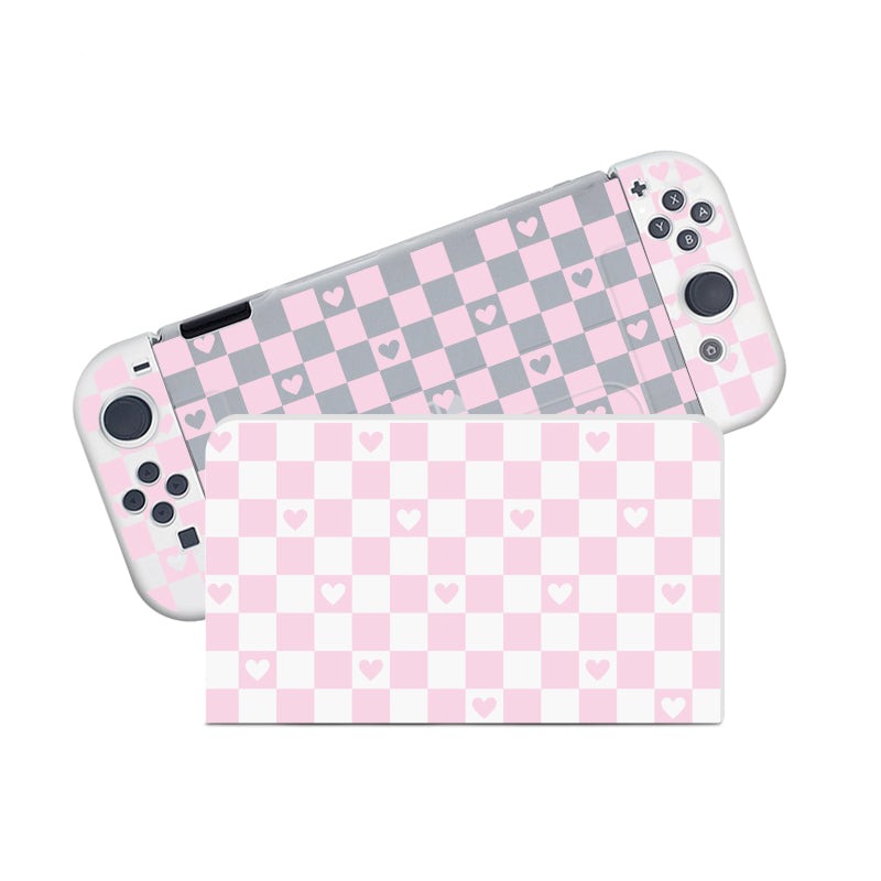 The Checkered Love Case for Nintendo Switch by petimint features a semi-clear pastel pink and white checkered design adorned with small white hearts. This stylish case seamlessly extends across the console, including its detachable controllers and screen, creating a cohesive and playful appearance reminiscent of fashionable gaming apparel.