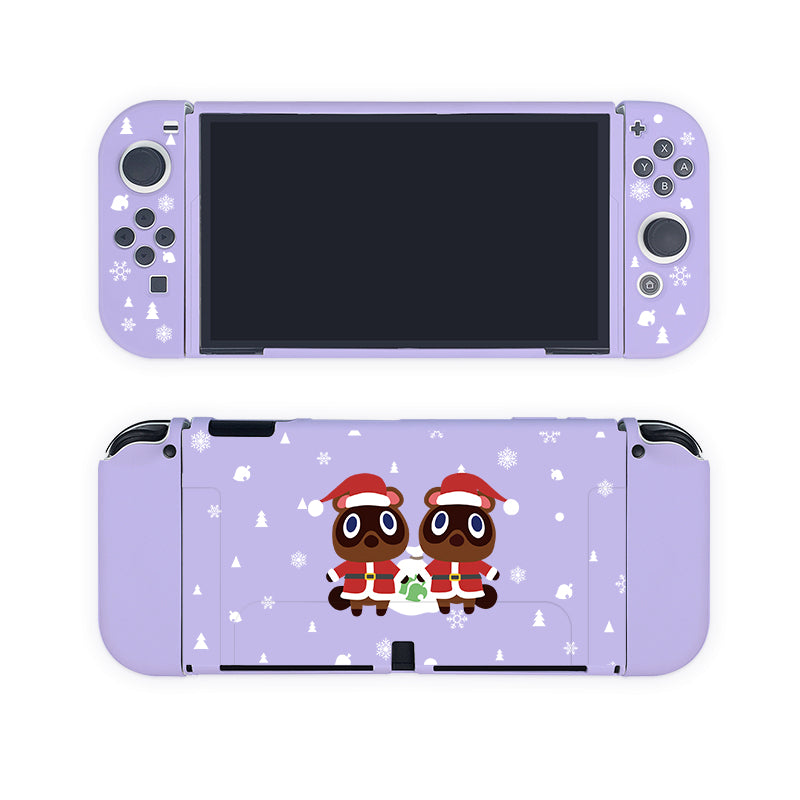 The Timmy & Tommy Christmas Case for Nintendo Switch by petimint is a lavender-colored gaming console cover with a charming cartoon design. It features two adorable animals wearing red Santa hats and scarves, holding a gift against a backdrop of snowflakes and winter-themed decorations. Perfect for the cozy gamer, this festive design spans both the controller and the console.