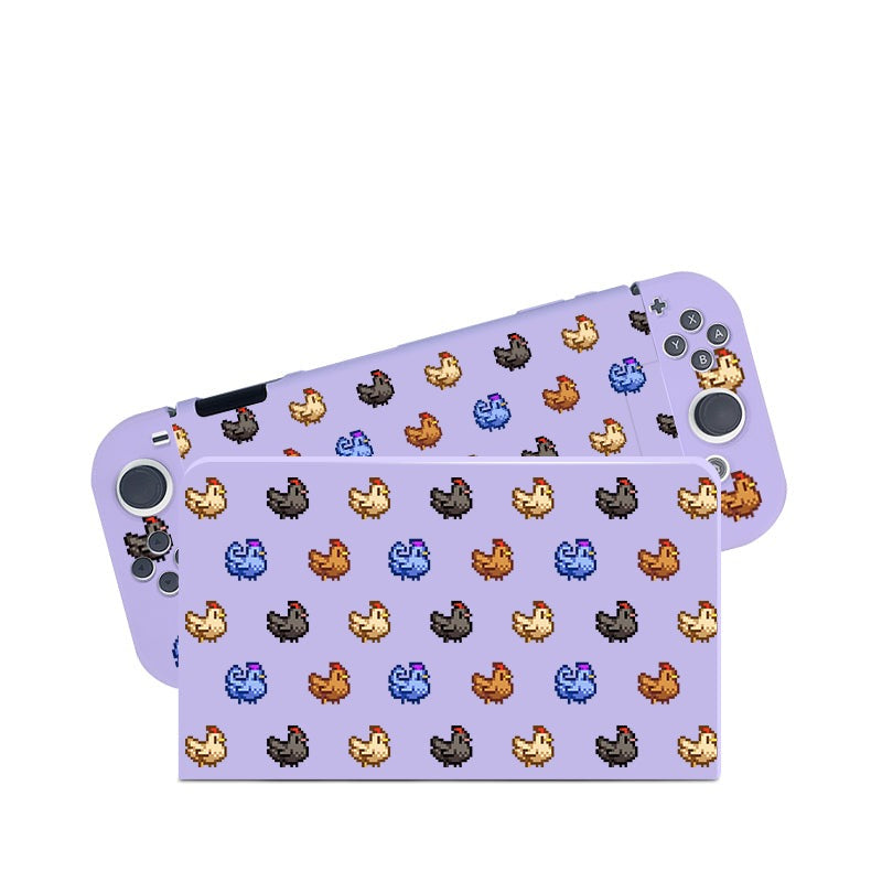 A Chicken Stardew Valley Case for Nintendo Switch by petimint, featuring a lavender skin with a pixel art pattern of chickens in various colors—white, black, brown, and yellow. The console's buttons and control sticks remain visible on the right side.