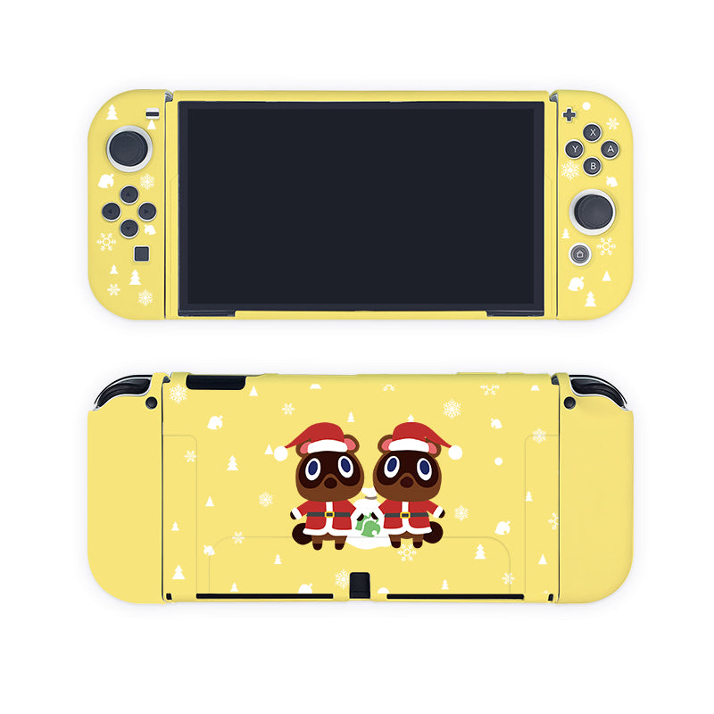 Introducing the Timmy & Tommy Christmas Case for Nintendo Switch by petimint: a yellow gaming console skin adorned with white snowflakes and small trees. The central design showcases two animal characters dressed in red Santa outfits, holding green garlands and standing side by side, making it perfect for the cozygamer who loves festive apparel in their gaming setup.