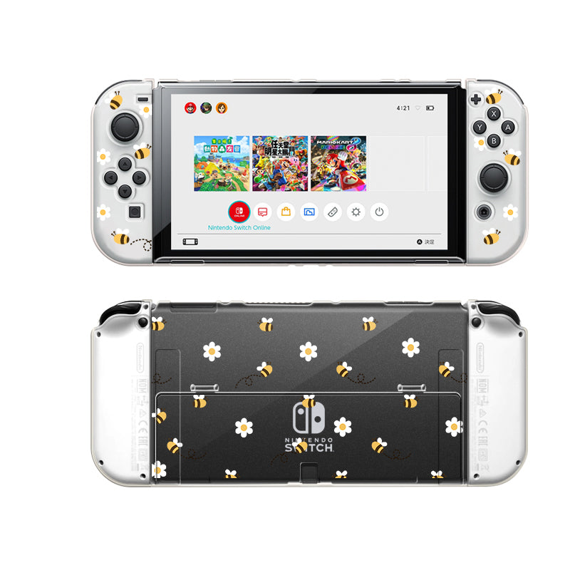 A Nintendo Switch console equipped with Joy-Con controllers, customized with the petimint Little Bee Case in a clear color, featuring a floral and bee design. The front screen displays the home menu showcasing various games, while the back of the gaming console and controllers is adorned with images of white flowers and bees.
