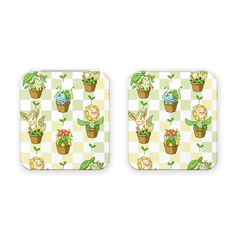 Enjoy a whimsical and playful vibe perfect for any cozygamer's setup with the Pokepots Game Card Box for Nintendo Switch from petimint. This box, featuring a white checkerboard background with green and yellow shades, showcases charming animated plant characters, including a Bulbasaur, in flowerpots scattered across the design.