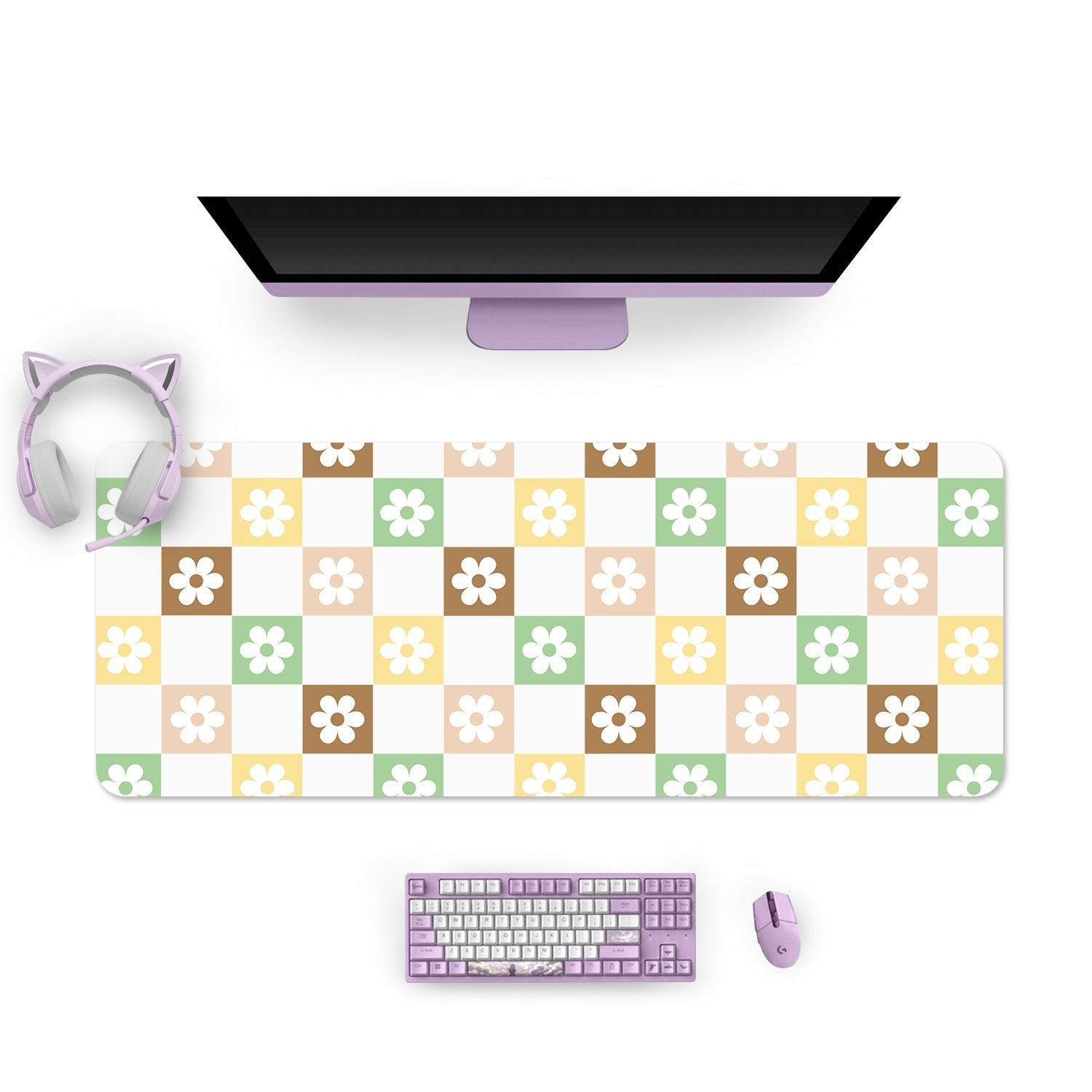 A gamer’s computer setup includes a monitor, a lavender keyboard, a matching mouse, and cat ear headphones. The desk mat underneath is the petimint Checkered Seasonal Flowers Mouse Pads Pc Gaming Accessories, featuring a checkered pattern with pastel squares in green, yellow, peach, and brown, each containing white or brown flowers.