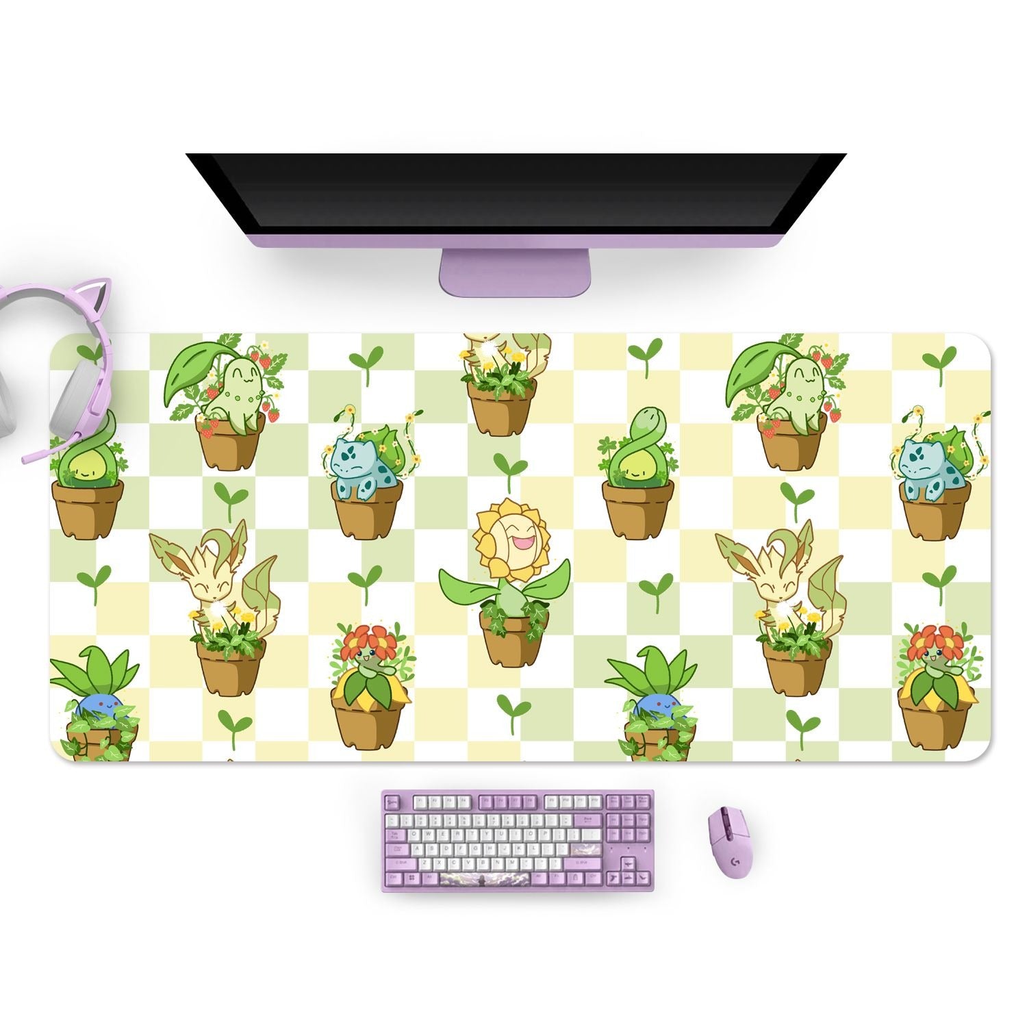 A computer setup featuring the petimint Pokepots Mouse Pads with a large, checkered background adorned with various cute plant creatures in pots. The setup includes a monitor, a pastel purple keyboard, a matching mouse, and a pair of headphones with cat ears—all perfect for gaming on your Nintendo Switch.