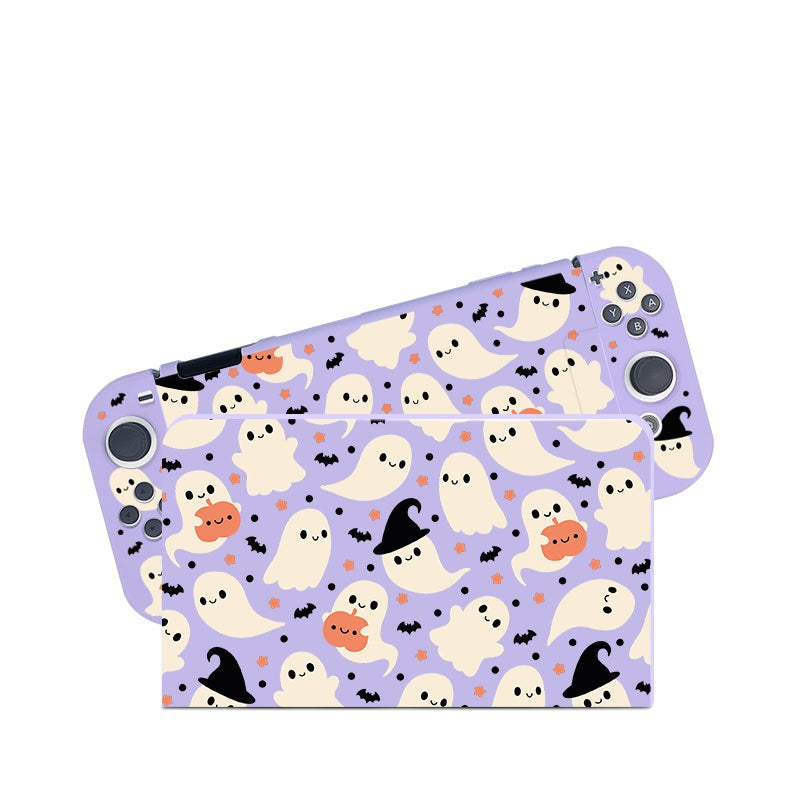 A Nintendo Switch adorned with a petimint Spooky Ghost Case, featuring a Halloween-themed design on a purple cover. Decorated with cute ghosts, bats, pumpkins, and witches' hats in a playful pattern, it's perfect for any cozygamer. The charming artwork embellishes both the front and back of the console.