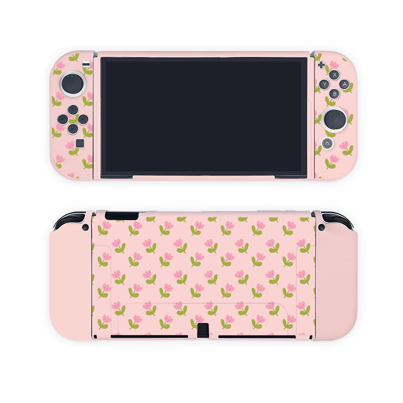 Introducing the petimint Pink Tulips Case for Nintendo Switch, perfect for the cozy gamer. This case features a charming pink floral skin with small flowers and green leaves on both the front and back, creating a cohesive, cheerful look.