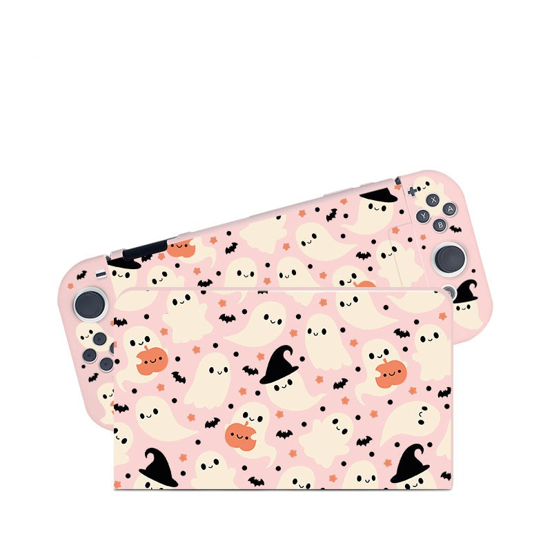 The Spooky Ghost Case for Nintendo Switch by petimint features a set of two pink gaming console covers, ideal for any cozy gamer. Adorned with cute white ghost illustrations that have black eyes and mouths, some ghosts even wear black witch hats while others hold orange pumpkins. The friendly, whimsical design includes tiny black bats scattered around, making it a perfect match for your Nintendo Switch.