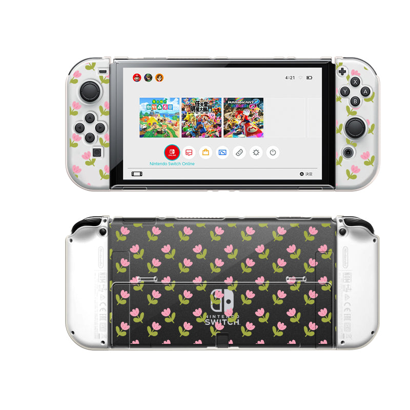 A Nintendo Switch console adorned with the Pink Tulips Case by petimint, showcasing Joy-Con controllers decorated with a charming floral pattern featuring pink flowers and green leaves. The console's menu is displayed on the screen, highlighting various game icons. Perfect for the cozy gamer, the back of the console features the same delightful floral design.