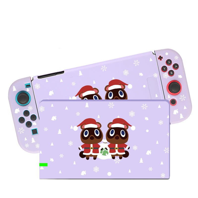 Introducing the petimint "Timmy & Tommy Christmas Case for Nintendo Switch," a purple gaming console case featuring two festive cartoon raccoons, Timmy and Tommy, adorned with Santa hats and scarves, surrounded by snowflakes. Perfect for the cozy gamer, this case sports a mirrored design on both the handheld section and detachable controllers.